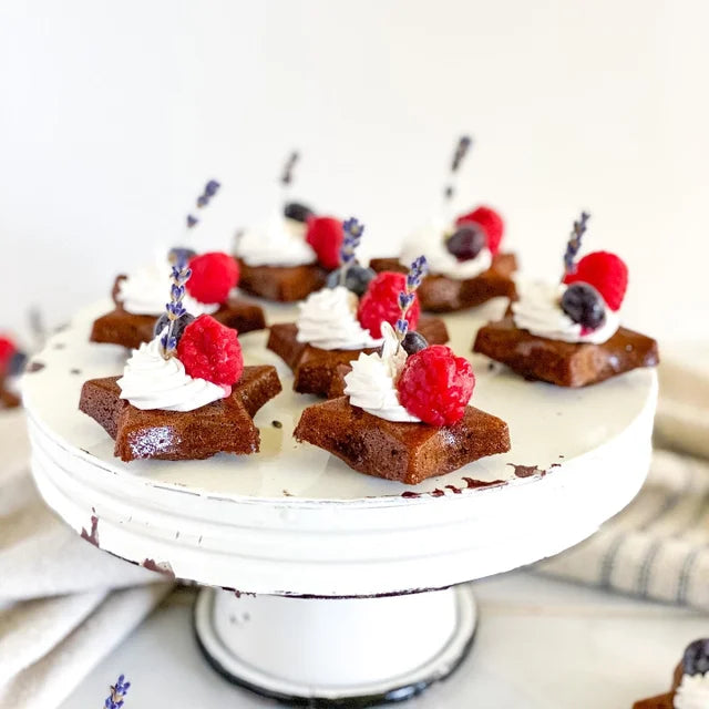Norwood-Lavender-Farm-Lavender-Fudge-Brownie-Mix-Serving-Suggestion-Brownie-Stars-on-Platter-with-fresh-berries-whipped-cream-and-lavender-sprigs
